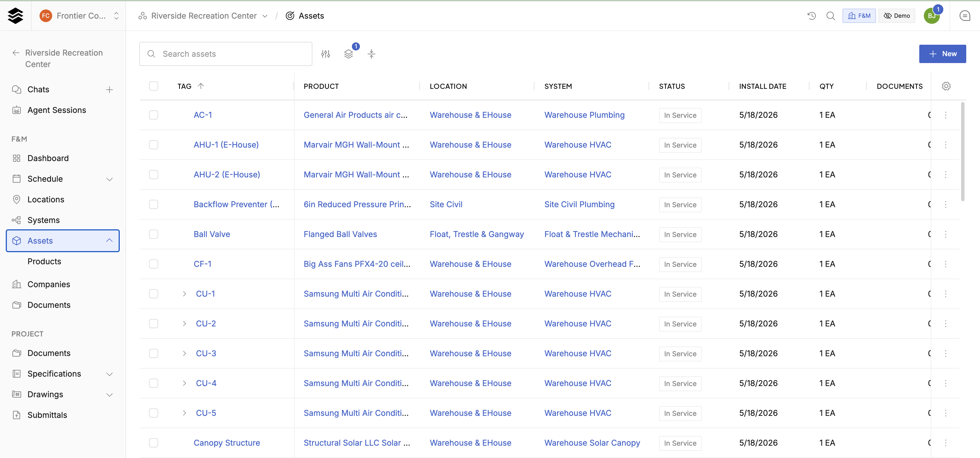 Assets list with tags, products, locations, systems, and status